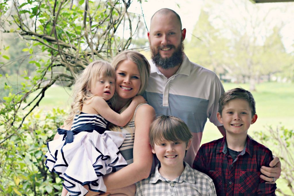 An outdoor professional photo of Tiffany and her beautiful family! Tiffany has great suggestions for going gluten-free.